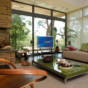 view of this living area featuring green coffee home, house, interior design, living room, real estate, window, brown