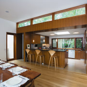 view of the kitchen dining area featuring teak dining room, interior design, real estate, room, brown, gray