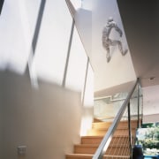 view of the stairway featuring stained/varnished timber steps angle, architecture, ceiling, daylighting, glass, handrail, home, house, interior design, product design, stairs, white