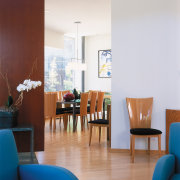 view of the interior of this home featuring apartment, architecture, ceiling, chair, furniture, home, interior design, living room, real estate, room, suite, table, waiting room, white