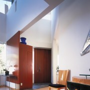 view of the interior of this home featuring architecture, ceiling, daylighting, floor, flooring, hardwood, home, house, interior design, loft, room, wall, wood, wood flooring, gray