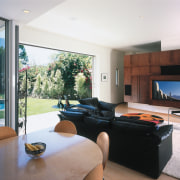 view of the interior of this home featuring architecture, home, house, interior design, living room, property, real estate, room, window, white