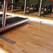 A view of some timber flooring from Moxon floor, flooring, furniture, gym, hardwood, laminate flooring, room, sport venue, structure, table, wood, wood flooring, orange, brown