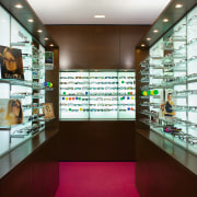 A view of a shop fitout by RCG. interior design, retail, red, white