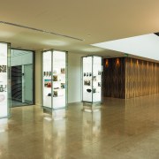 A view of the AirNZ building. - A architecture, ceiling, floor, flooring, glass, interior design, lobby, brown, white