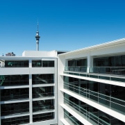 A view of the AirNZ building. - A architecture, building, city, condominium, corporate headquarters, sky, teal, black