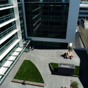 A view of some construction work done by architecture, building, city, condominium, corporate headquarters, mixed use, window, gray, black