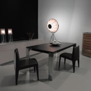 View of black dining table and chairs with chair, coffee table, desk, furniture, interior design, product design, still life photography, table, gray, black