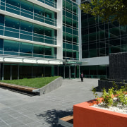 A view of the AirNZ building. - A apartment, architecture, building, campus, city, commercial building, condominium, corporate headquarters, daytime, facade, headquarters, metropolitan area, mixed use, neighbourhood, real estate, residential area, sky, urban area, urban design, window, gray