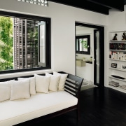 Glass doors in the familiy room open to floor, interior design, living room, window, gray, black