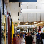 A view of soe signage by Corada. - airport, gray