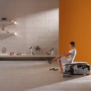 A view of some stoneware from Rocks-On-Hard Surfaces floor, flooring, furniture, interior design, room, table, tile, wall, wood, gray, brown