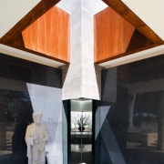 view of this gard with sun shining through architecture, building, facade, home, house, black, white