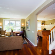 A view of the living area, wooden flooring ceiling, daylighting, estate, floor, flooring, hardwood, home, house, interior design, laminate flooring, living room, property, real estate, room, window, wood, wood flooring, gray, brown