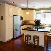 A view of the kitchen area, wooden flooring, cabinetry, countertop, cuisine classique, floor, flooring, hardwood, interior design, kitchen, real estate, room, wood flooring, brown