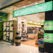 A view of a shop fitted out by interior design, outlet store, retail, shopping mall, orange