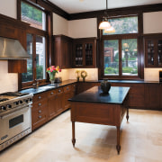 View of the kitchen featuring viking oven and cabinetry, countertop, cuisine classique, interior design, kitchen, room, black, gray