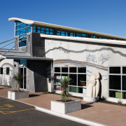 A view of the Papamoa Library. - A architecture, building, commercial building, elevation, house, property, real estate, black