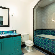 A second family bathroom repeats the theme of bathroom, blue, estate, floor, home, interior design, property, room, tile, window, white