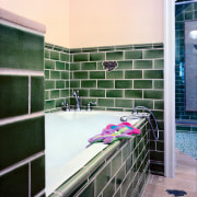 view of this bathroom featuring green glazed tiled architecture, bathroom, floor, flooring, glass, interior design, room, tile, wall, white