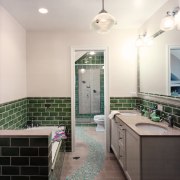 view of this bathroom featuring a double vainty bathroom, ceiling, countertop, daylighting, floor, home, interior design, real estate, room, tile, wall, white