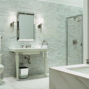 view of the new Kohler Chicago store showcasing bathroom, bathroom accessory, bathroom cabinet, bathroom sink, ceramic, floor, interior design, plumbing fixture, product design, room, sink, tap, tile, wall, gray