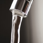 A view of a hot water cylinder from arm, product design, tap, water, black, gray