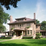 Exterior view of this restored brick Mansion, landscaped building, estate, facade, historic house, home, house, manor house, mansion, official residence, property, real estate, stately home, villa, white