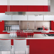 A large rangehood above the kitchen island provides cabinetry, countertop, cuisine classique, interior design, kitchen, product design, white, red