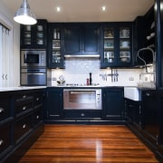 A view of a carpentry-built kitchen by Scullery cabinetry, countertop, floor, flooring, hardwood, home, interior design, kitchen, room, wood, wood flooring, black