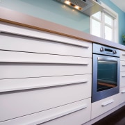 close up view of the blum kitchen cabinetry cabinetry, countertop, home appliance, kitchen, kitchen appliance, major appliance, gray, white