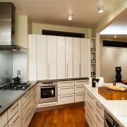 A view of the kitchen area, wooden flooring cabinetry, countertop, cuisine classique, interior design, kitchen, real estate, room, white, brown