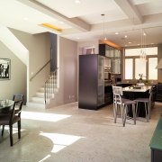 A view of this kitchen and living area ceiling, floor, flooring, interior design, living room, real estate, gray