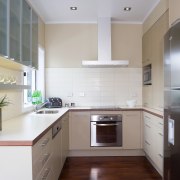 A view of a kitchen designed by YellowFox. cabinetry, countertop, cuisine classique, interior design, kitchen, property, real estate, room, gray, white