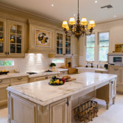 A view of the kitchen and dining areas, cabinetry, countertop, cuisine classique, interior design, kitchen, room, brown, gray