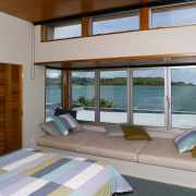 View of the master bedroom featuring extensive glazing architecture, bedroom, door, estate, house, interior design, real estate, room, window, gray