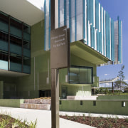 A view of some signage by Dot Dash. architecture, building, commercial building, condominium, corporate headquarters, daytime, headquarters, metropolitan area, mixed use, real estate, residential area, white