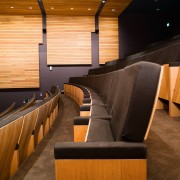 A view of some seating from Civic Seating architecture, auditorium, flooring, furniture, interior design, lobby, wood, brown, orange, black