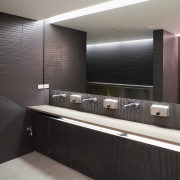 A view of some plubing by Beavis and bathroom, interior design, room, sink, black, gray