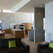 View of the Kitchen an surrounding living areas apartment, architecture, ceiling, daylighting, floor, home, house, interior design, living room, lobby, room, table, wall, gray, black