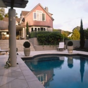 A view of some paving from Original Stone. backyard, estate, home, house, outdoor structure, patio, property, real estate, residential area, swimming pool, villa, yard, gray