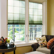 view of sitting area with chair, stool and curtain, door, home, interior design, living room, room, shade, window, window blind, window covering, window treatment, wood, brown, gray