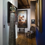 A view of the hallway to the master exhibition, flooring, furniture, interior design, room, gray, brown