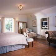 Bedroom with white bedding and timber flooring. - bed, bedroom, ceiling, estate, floor, furniture, home, house, interior design, living room, property, real estate, room, wall, window, wood, gray