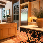 View of traditional kitchen with stainless steel refrigerator. cabinetry, countertop, cuisine classique, flooring, furniture, home, interior design, kitchen, real estate, room, window, brown