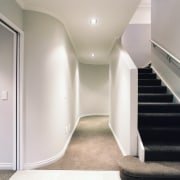 A view of the curved plasterboard walls installed architecture, ceiling, daylighting, floor, flooring, home, interior design, product design, property, real estate, stairs, gray
