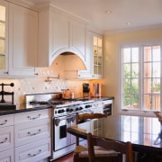 A view of the kitchen, wooden flooring, cabinetry cabinetry, countertop, cuisine classique, home, interior design, kitchen, real estate, room, window, gray