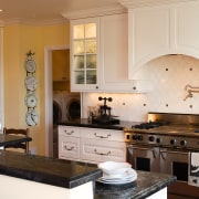 A view of the kitchen area, wooden flooring cabinetry, countertop, cuisine classique, home, interior design, kitchen, room, white