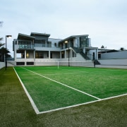 A view of some turf from TigerTurf. - artificial turf, ball game, estate, grass, house, lawn, leisure, leisure centre, plant, property, real estate, sport venue, sports, structure, white