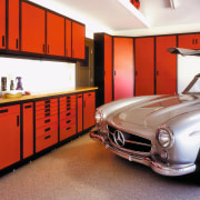 View of home garage with red storage cabinets automotive design, automotive exterior, car, classic, interior design, motor vehicle, personal luxury car, sports car, vehicle, red, white